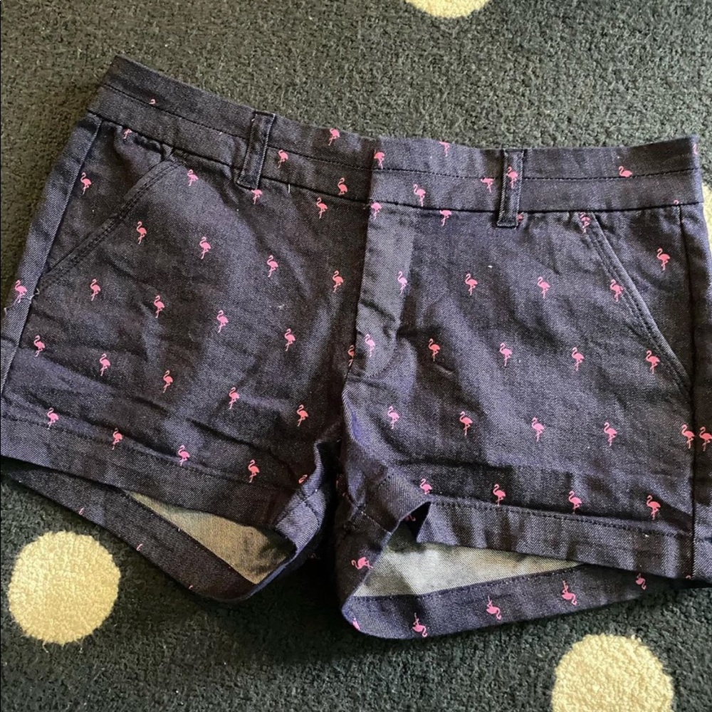 jeans shorts embroidered with flamingoes